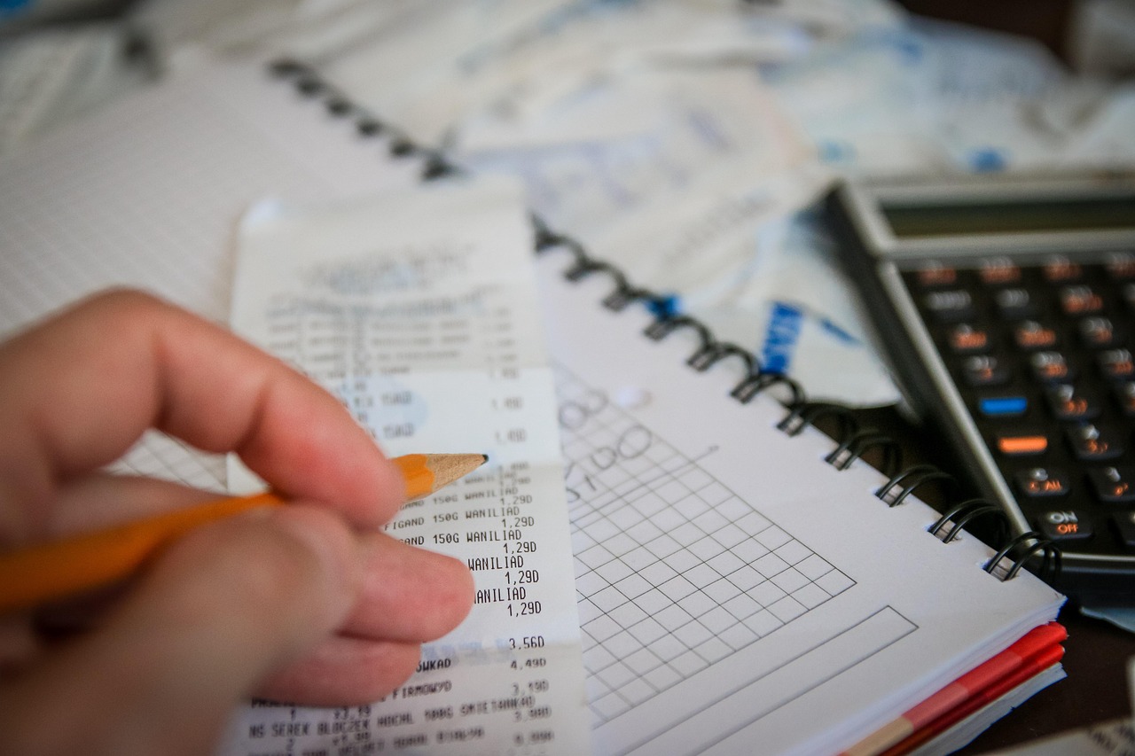 Money, bills, calculator — Boston Insights: Ralph Dangelmaier Advice on Marketing Mistakes to Avoid