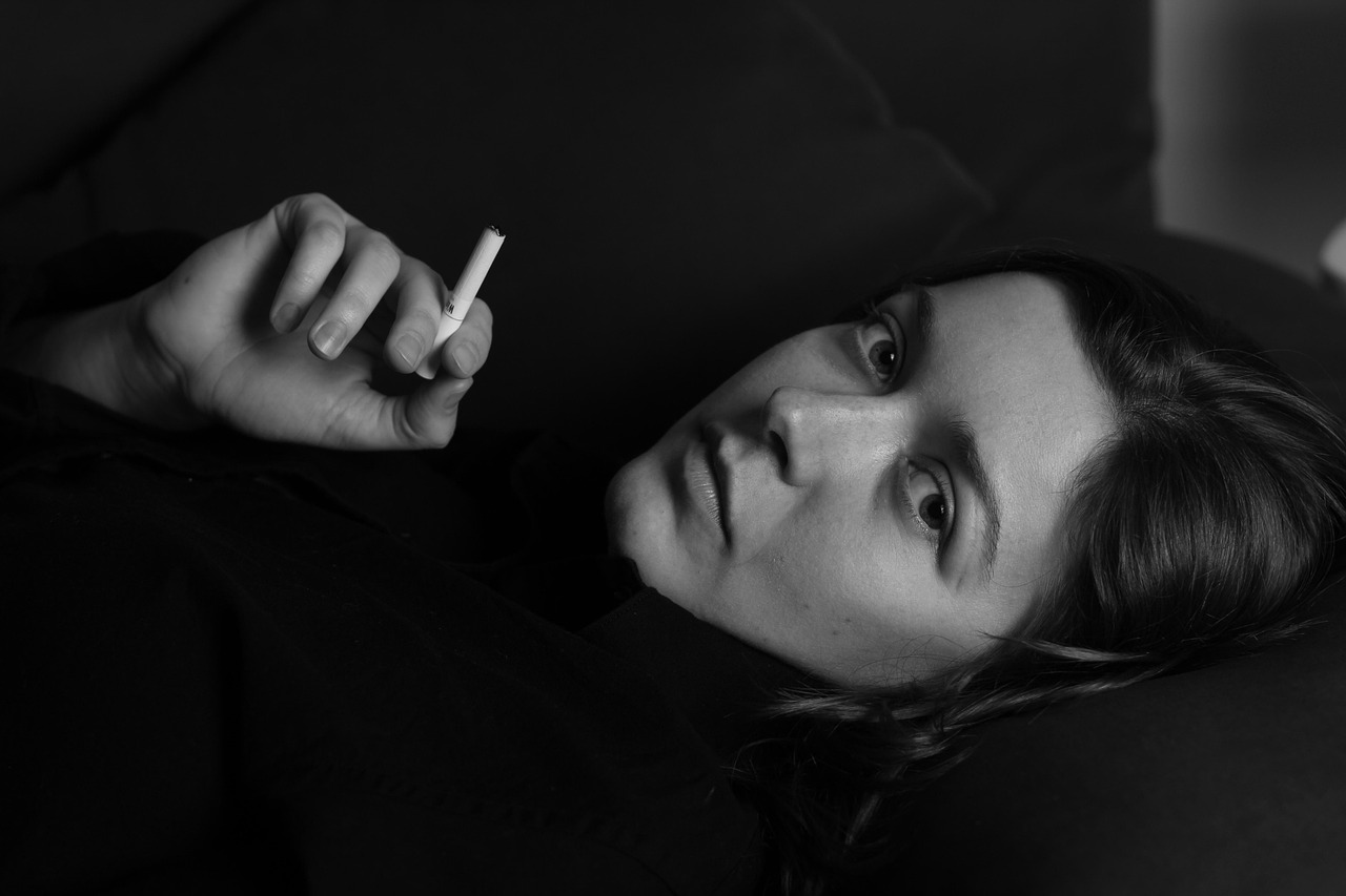Woman, cigarette, smoking — Ensuring Patient Wellness Through the Professional Expertise of Dr. Rodolfo Giraldi
