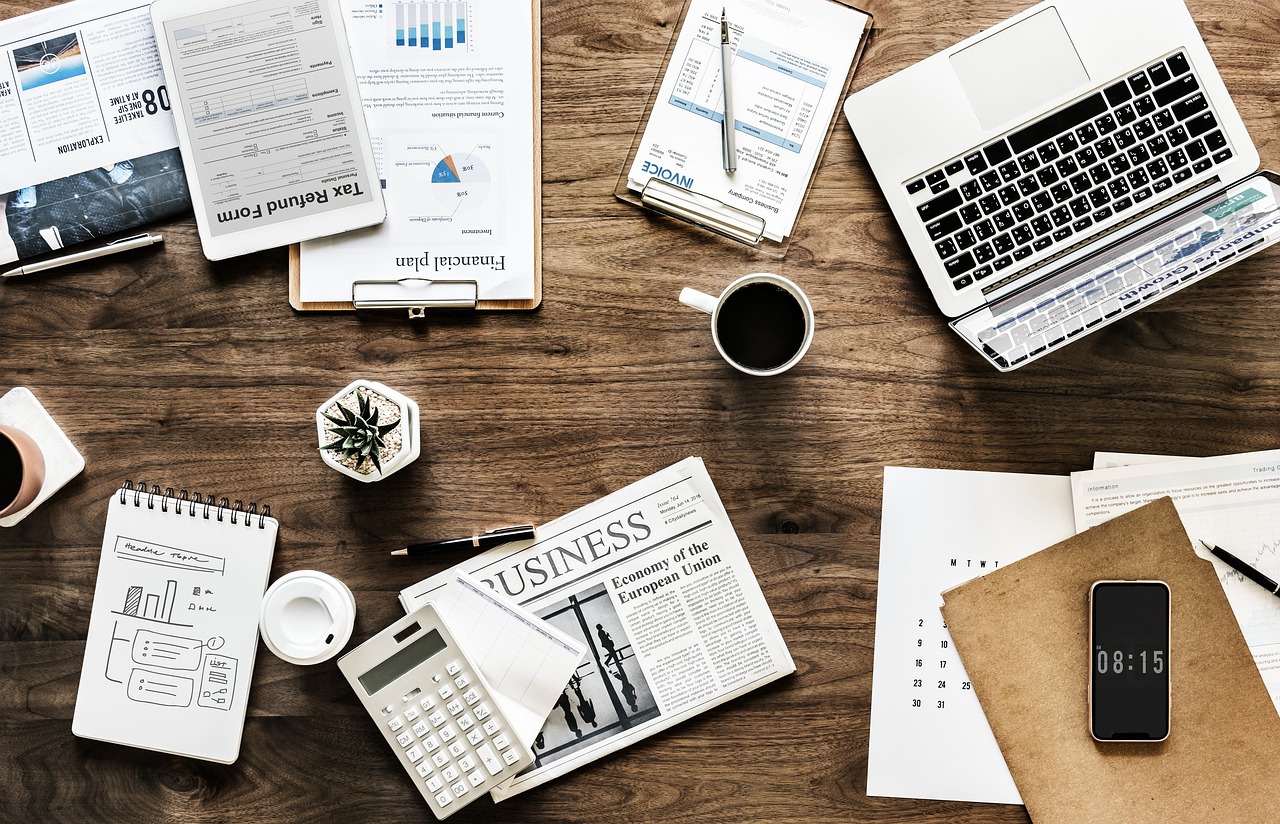 Desk, work, business — Kevin Kuykendall - Proven Leader in Private Equity, M&A, and Business Expansion
